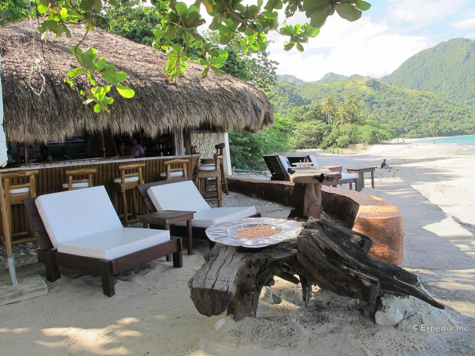 Sunset At Aninuan Beach Resort Пуэрто-Галера Экстерьер фото